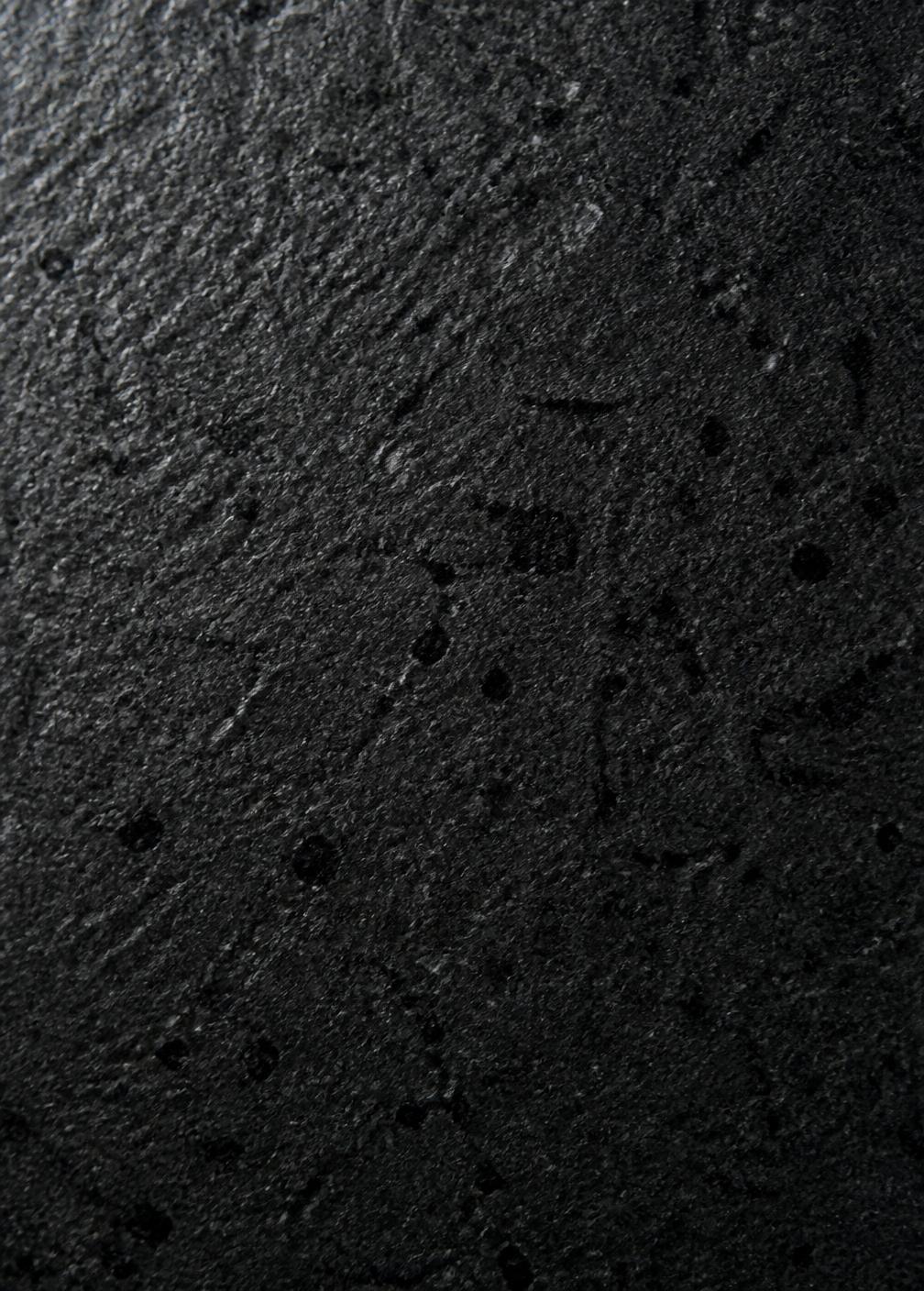 Honed dark granite sample
